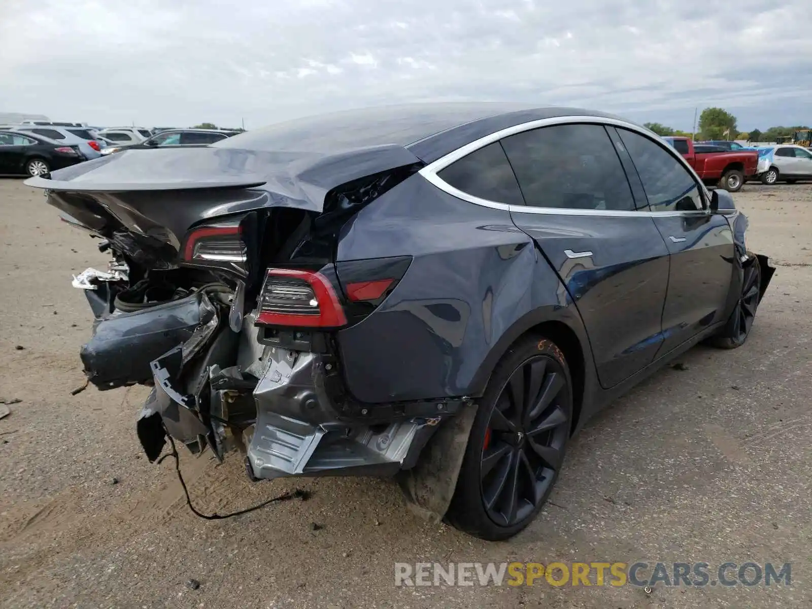 4 Photograph of a damaged car 5YJ3E1EC0LF774973 TESLA MODEL 3 2020