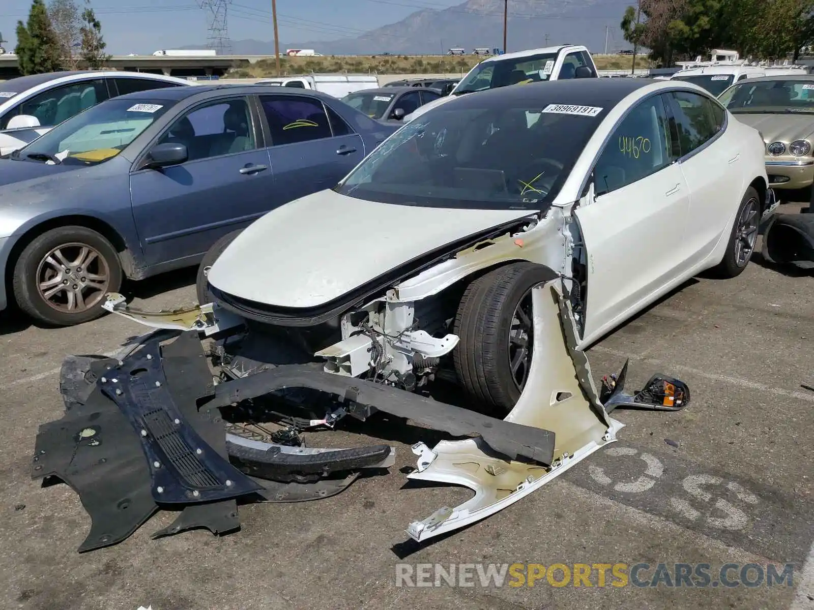 2 Photograph of a damaged car 5YJ3E1EC1LF602001 TESLA MODEL 3 2020