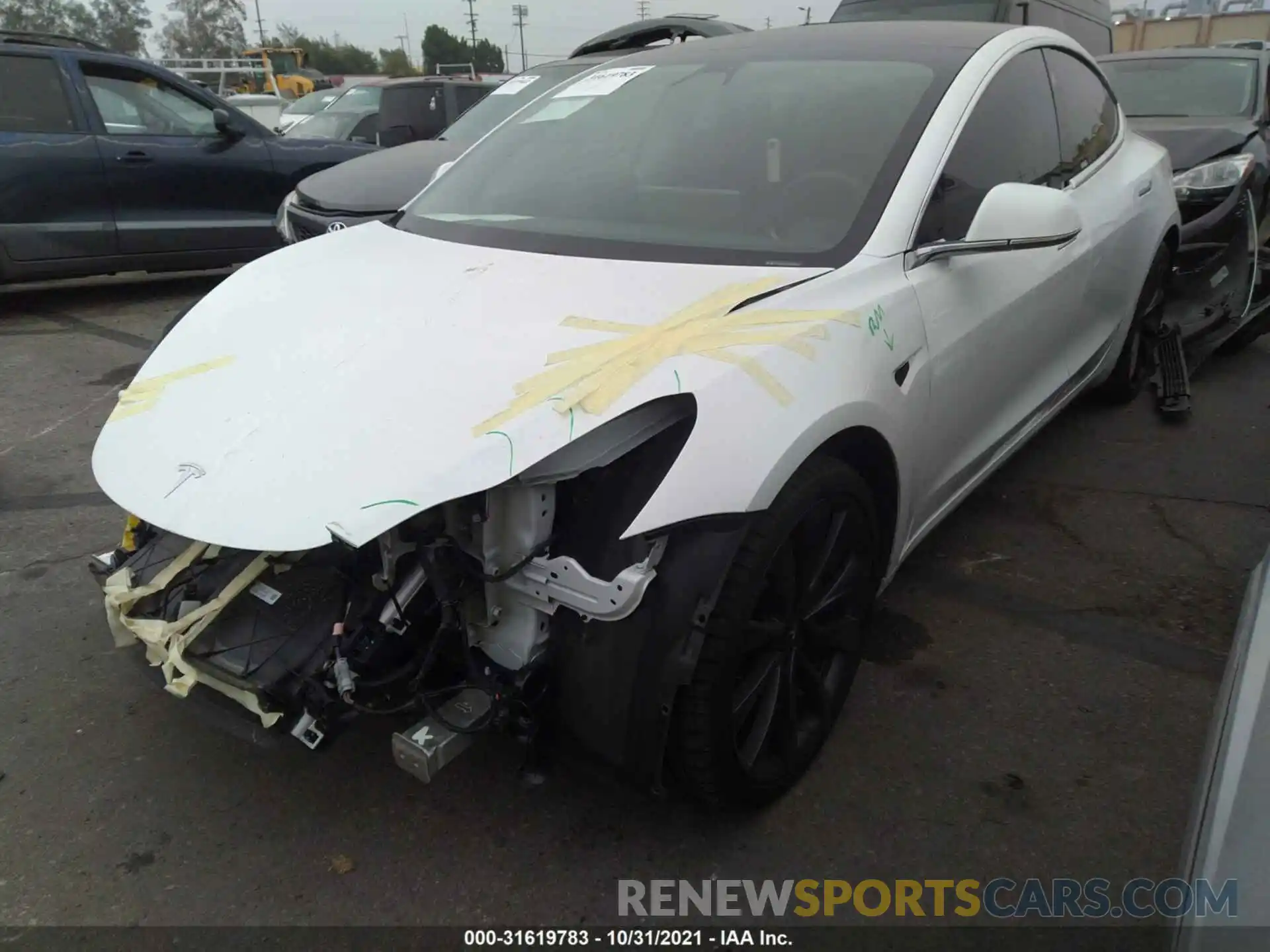 2 Photograph of a damaged car 5YJ3E1EC1LF624404 TESLA MODEL 3 2020