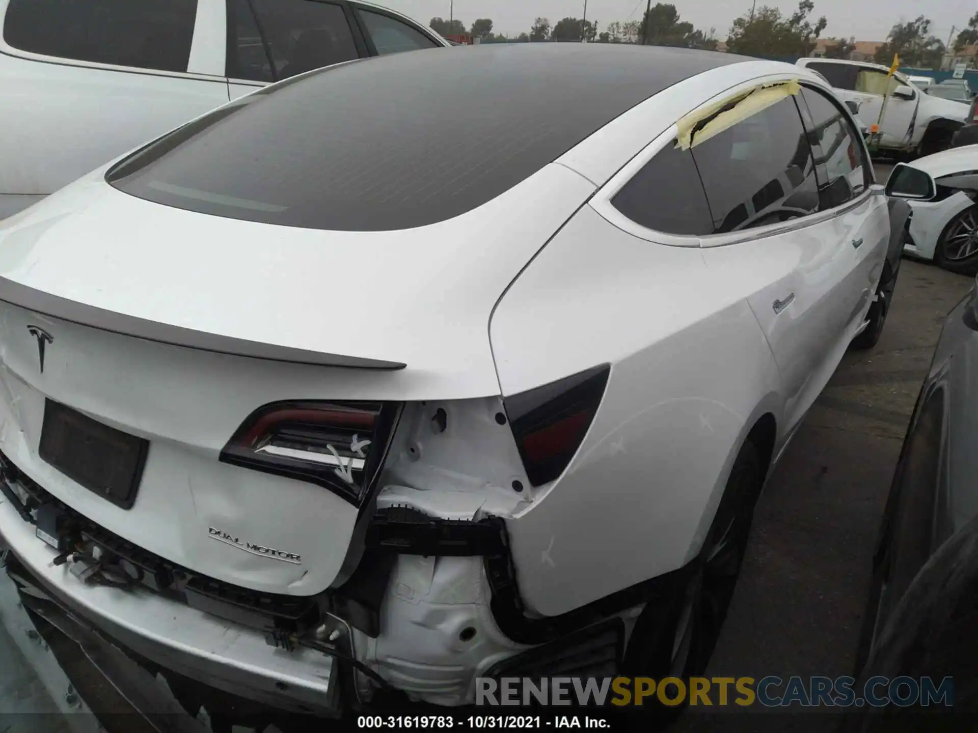 4 Photograph of a damaged car 5YJ3E1EC1LF624404 TESLA MODEL 3 2020