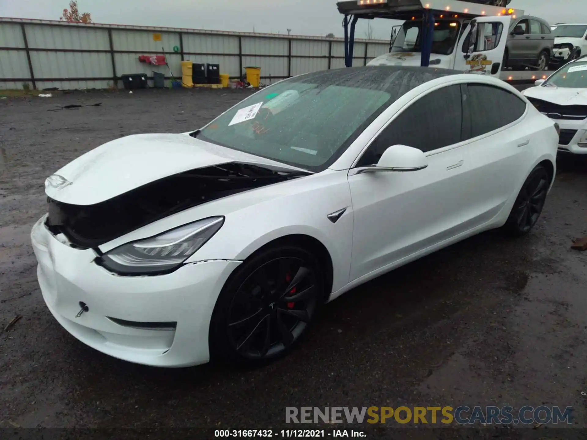 2 Photograph of a damaged car 5YJ3E1EC1LF719450 TESLA MODEL 3 2020