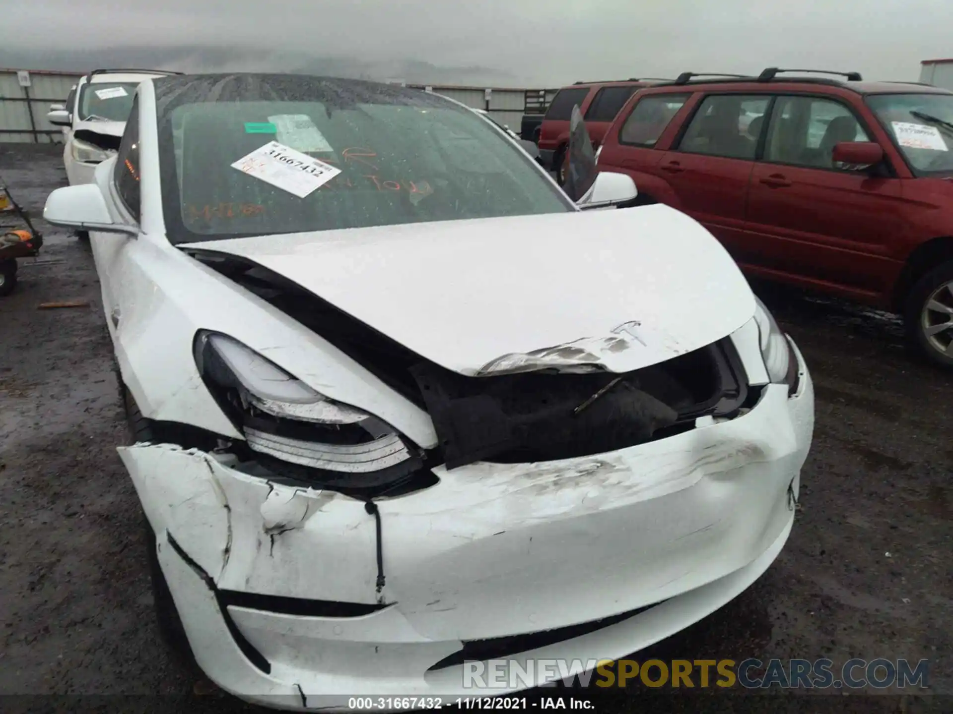 6 Photograph of a damaged car 5YJ3E1EC1LF719450 TESLA MODEL 3 2020