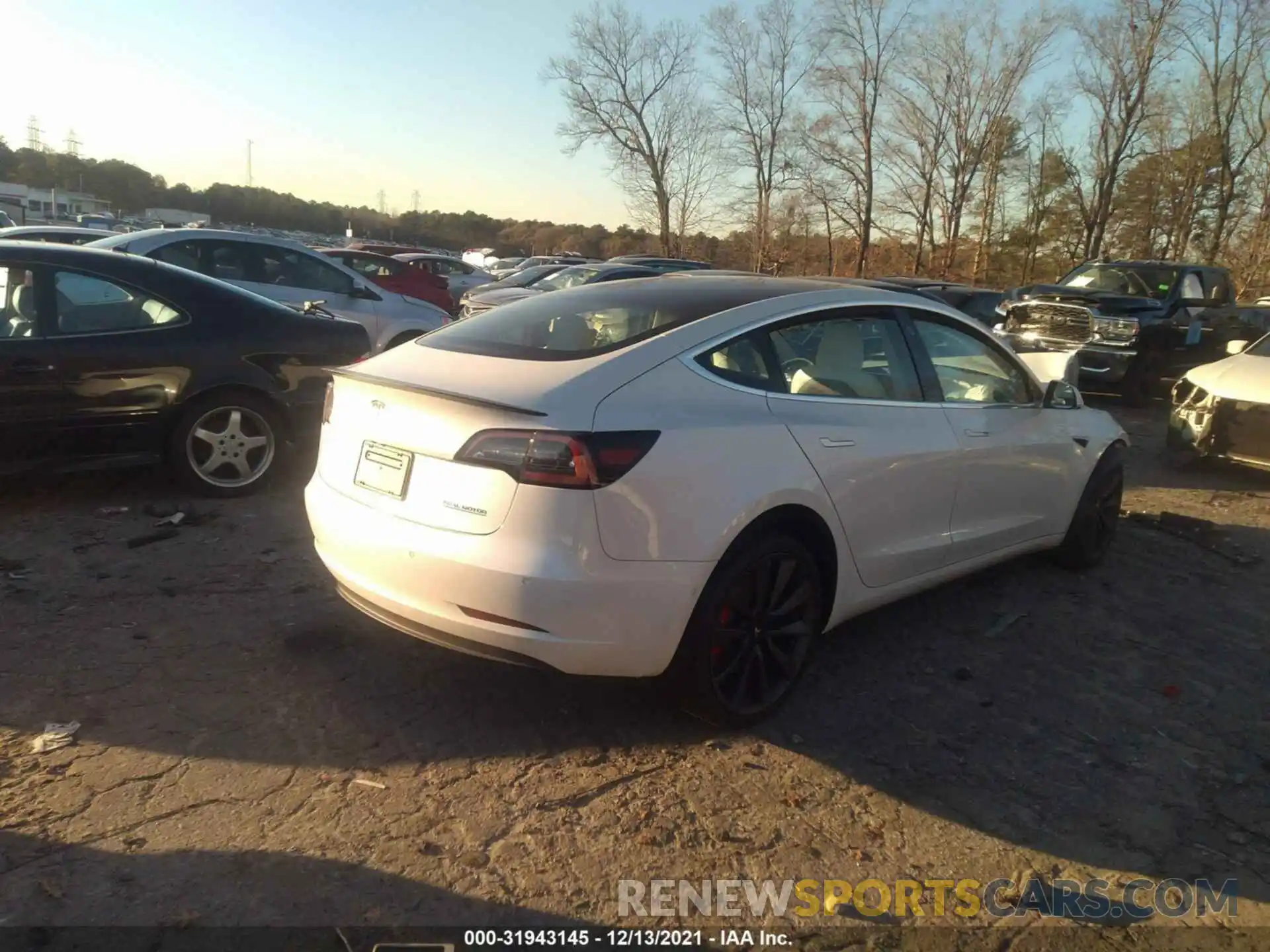 4 Photograph of a damaged car 5YJ3E1EC1LF736412 TESLA MODEL 3 2020