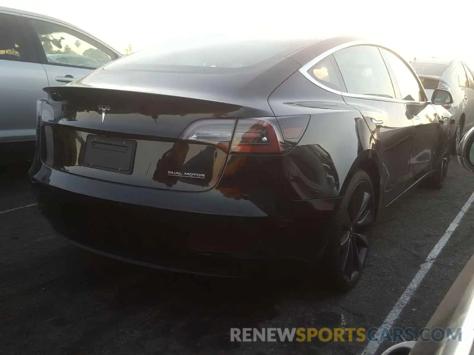 4 Photograph of a damaged car 5YJ3E1EC1LF774965 TESLA MODEL 3 2020