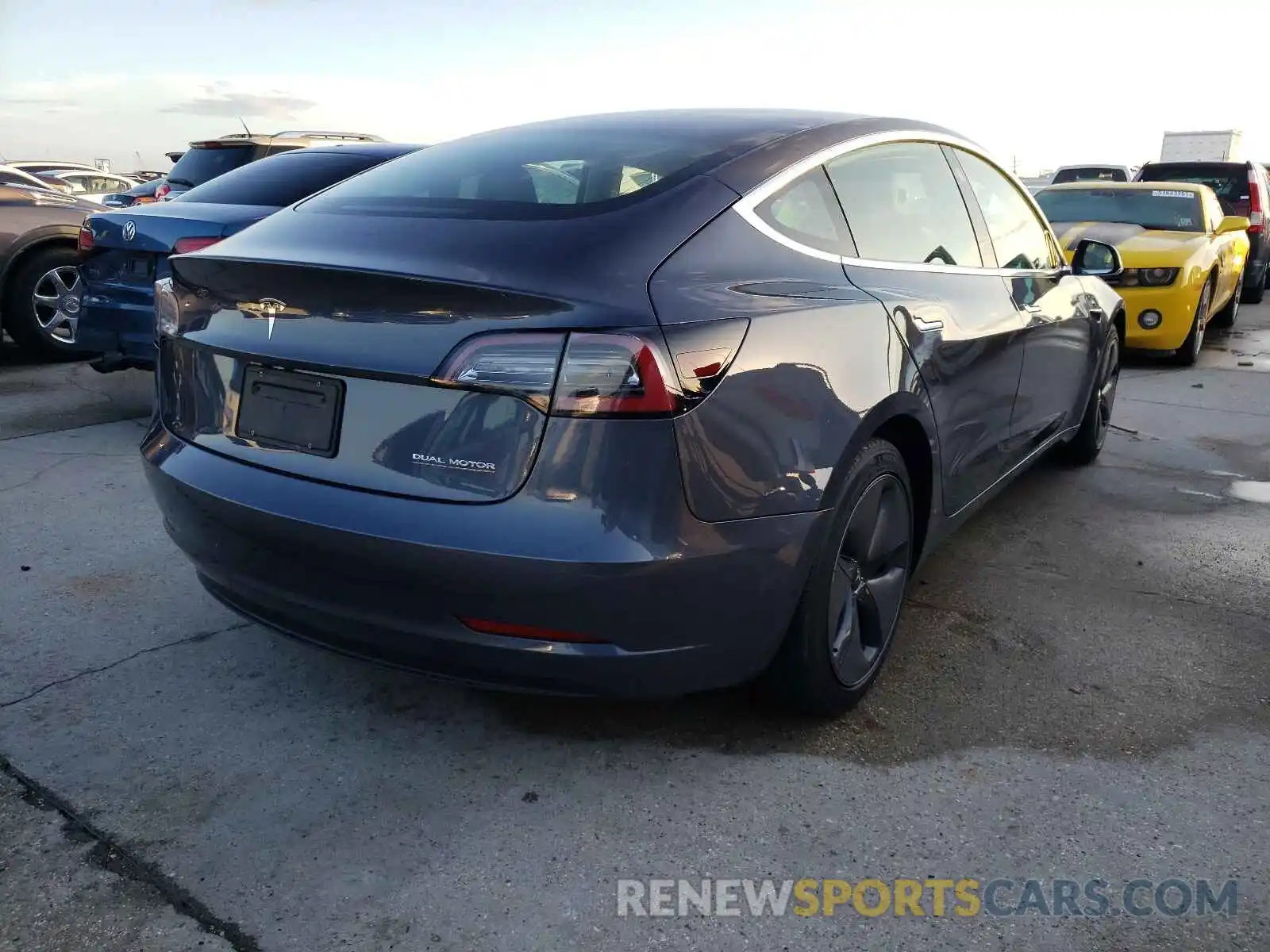 4 Photograph of a damaged car 5YJ3E1EC2LF601679 TESLA MODEL 3 2020