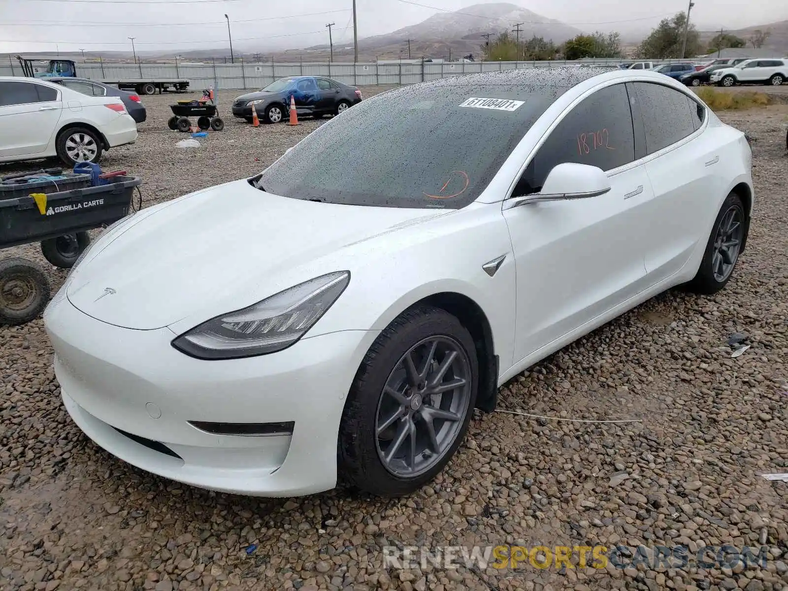 2 Photograph of a damaged car 5YJ3E1EC2LF602640 TESLA MODEL 3 2020