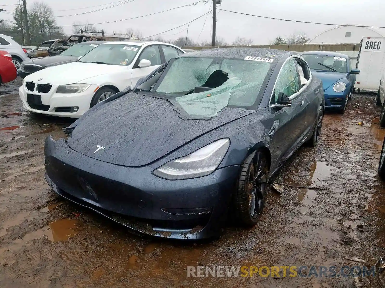 2 Photograph of a damaged car 5YJ3E1EC2LF602962 TESLA MODEL 3 2020