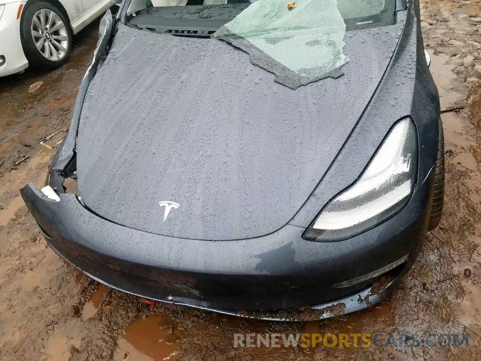 7 Photograph of a damaged car 5YJ3E1EC2LF602962 TESLA MODEL 3 2020