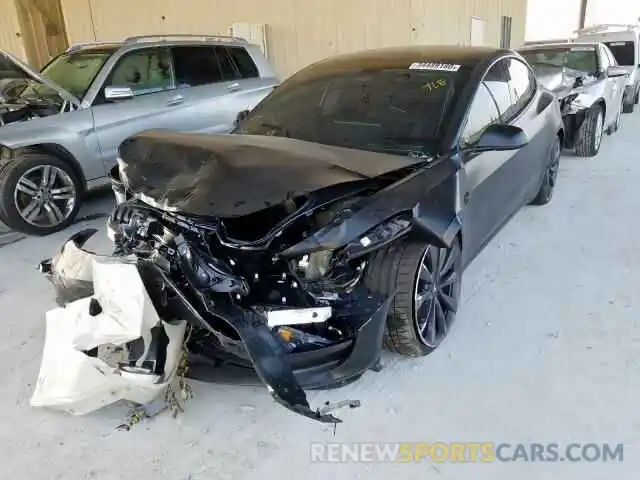 2 Photograph of a damaged car 5YJ3E1EC2LF640675 TESLA MODEL 3 2020