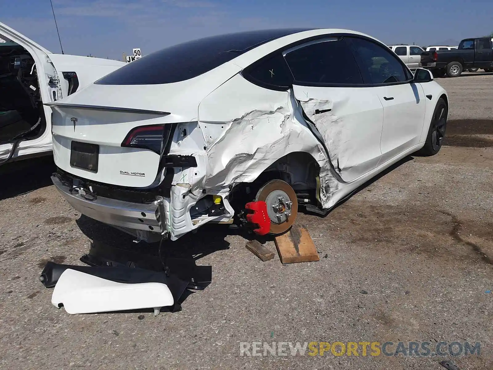 4 Photograph of a damaged car 5YJ3E1EC2LF642099 TESLA MODEL 3 2020