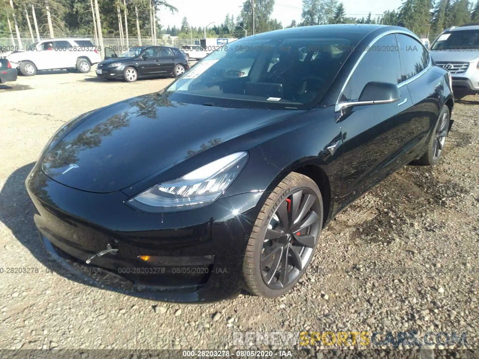 2 Photograph of a damaged car 5YJ3E1EC2LF669223 TESLA MODEL 3 2020