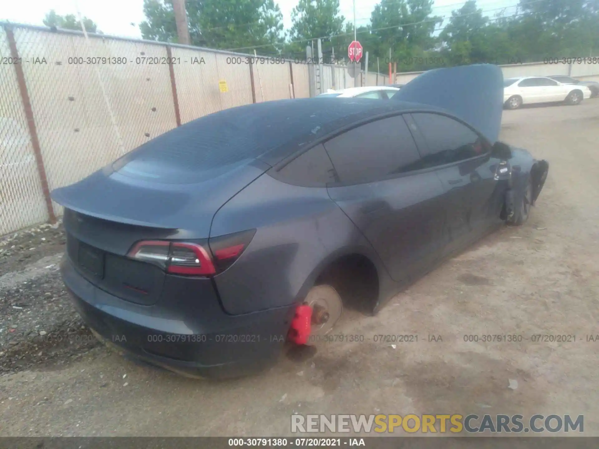 4 Photograph of a damaged car 5YJ3E1EC2LF713558 TESLA MODEL 3 2020