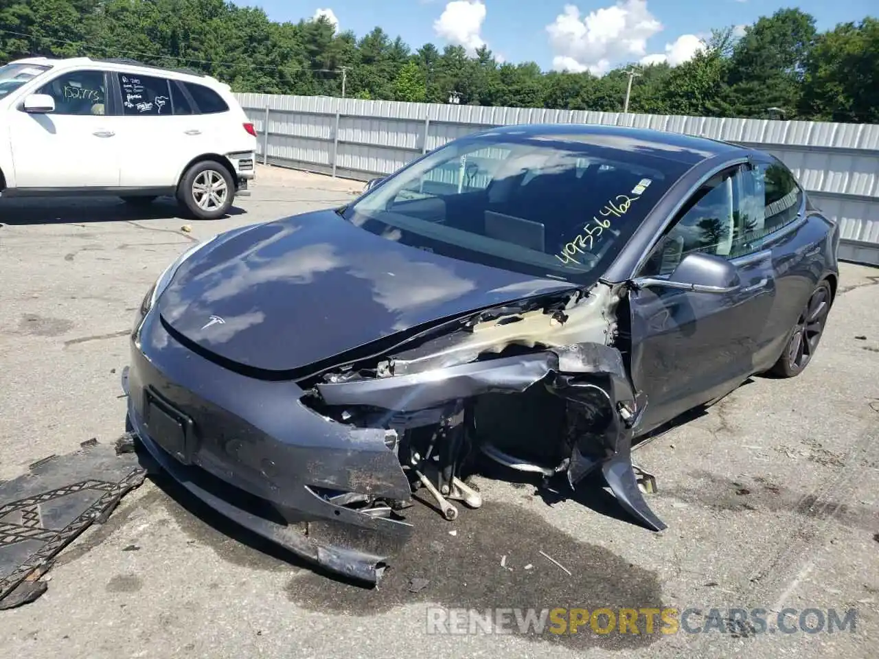 2 Photograph of a damaged car 5YJ3E1EC2LF788132 TESLA MODEL 3 2020