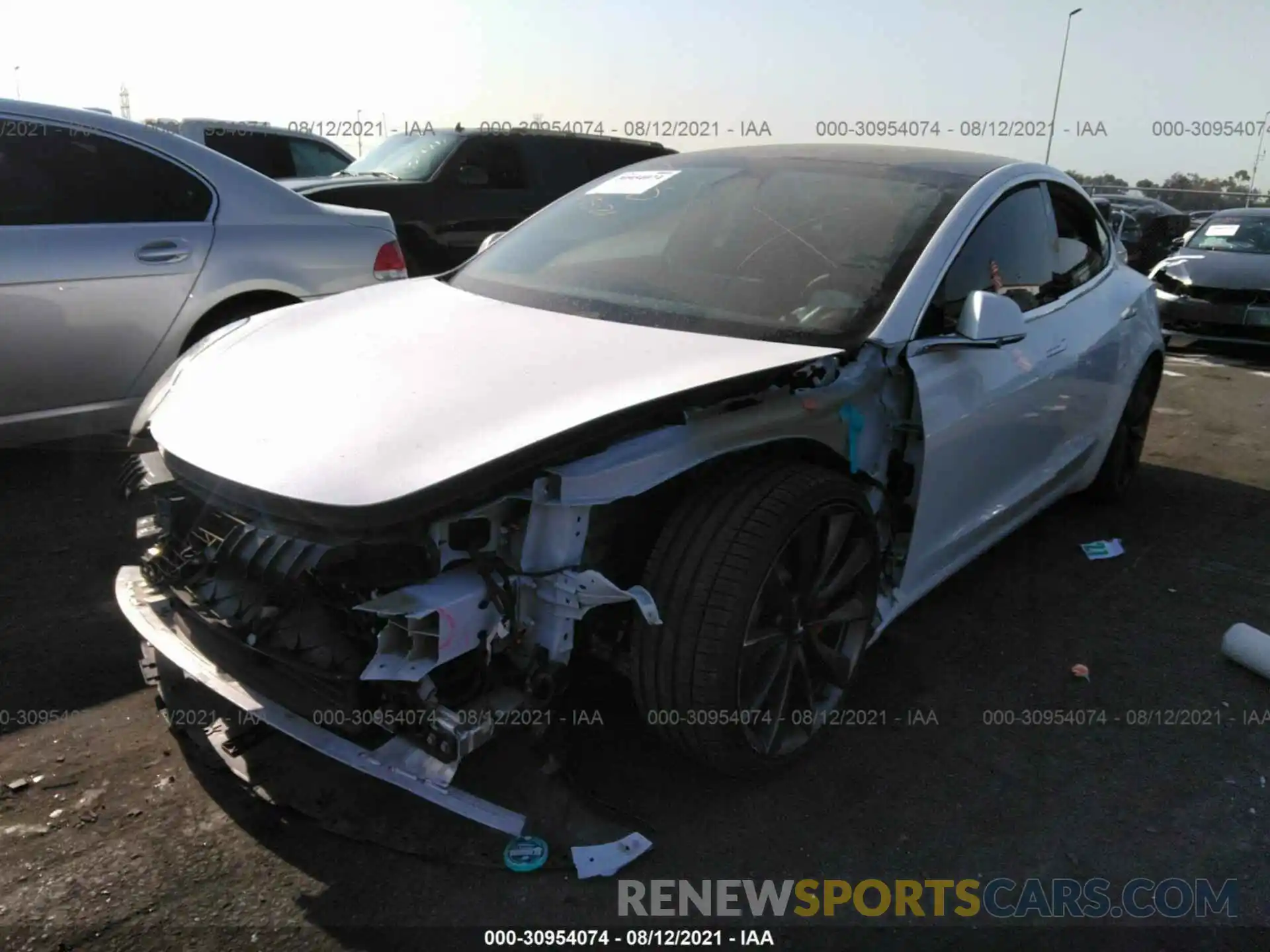 2 Photograph of a damaged car 5YJ3E1EC3LF719577 TESLA MODEL 3 2020