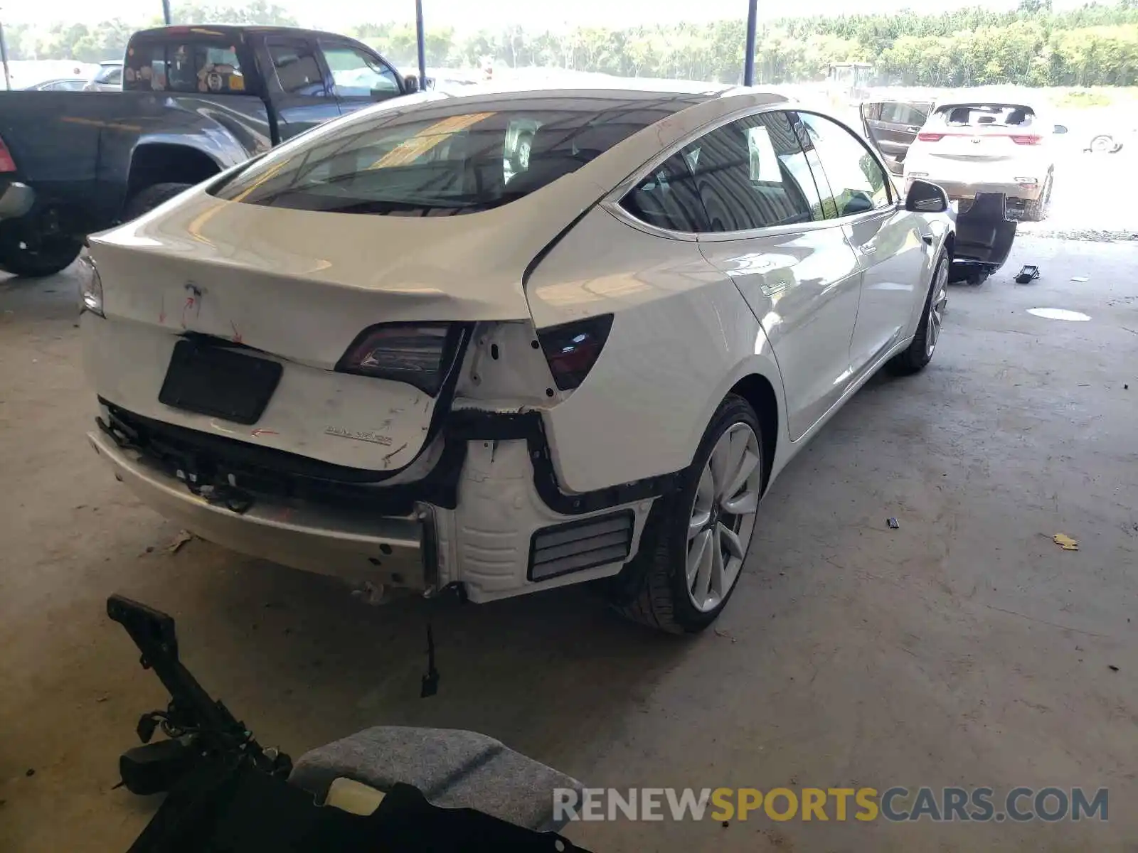 4 Photograph of a damaged car 5YJ3E1EC4LF586943 TESLA MODEL 3 2020