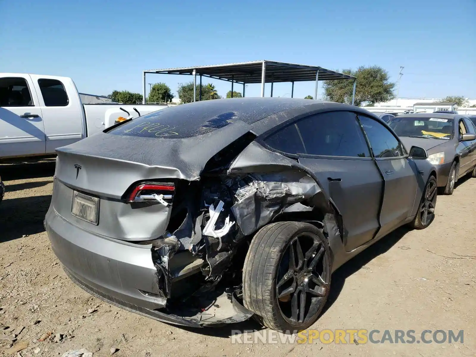 4 Photograph of a damaged car 5YJ3E1EC4LF601375 TESLA MODEL 3 2020