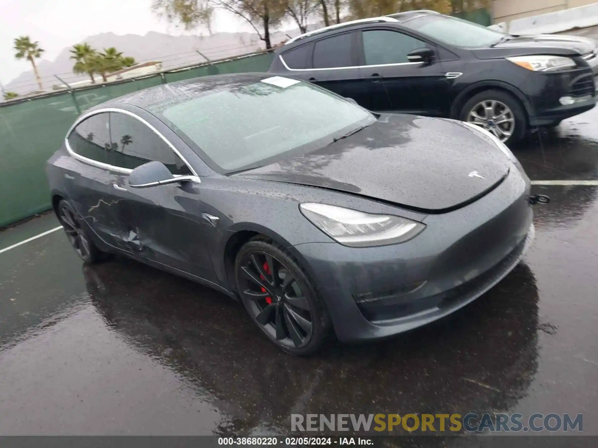 1 Photograph of a damaged car 5YJ3E1EC4LF719720 TESLA MODEL 3 2020