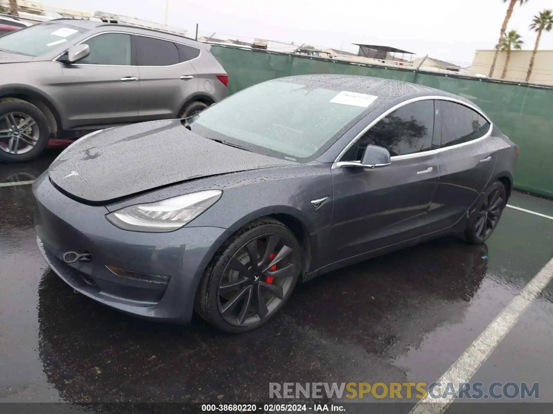 2 Photograph of a damaged car 5YJ3E1EC4LF719720 TESLA MODEL 3 2020