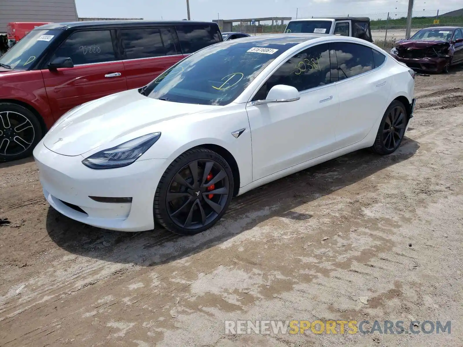 2 Photograph of a damaged car 5YJ3E1EC4LF800197 TESLA MODEL 3 2020