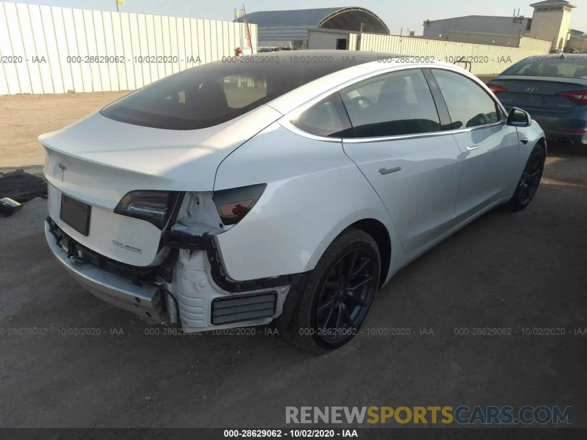 4 Photograph of a damaged car 5YJ3E1EC5LF601949 TESLA MODEL 3 2020