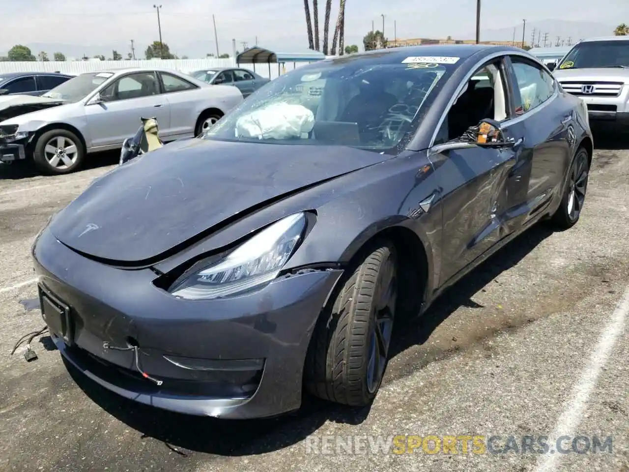 2 Photograph of a damaged car 5YJ3E1EC5LF647216 TESLA MODEL 3 2020