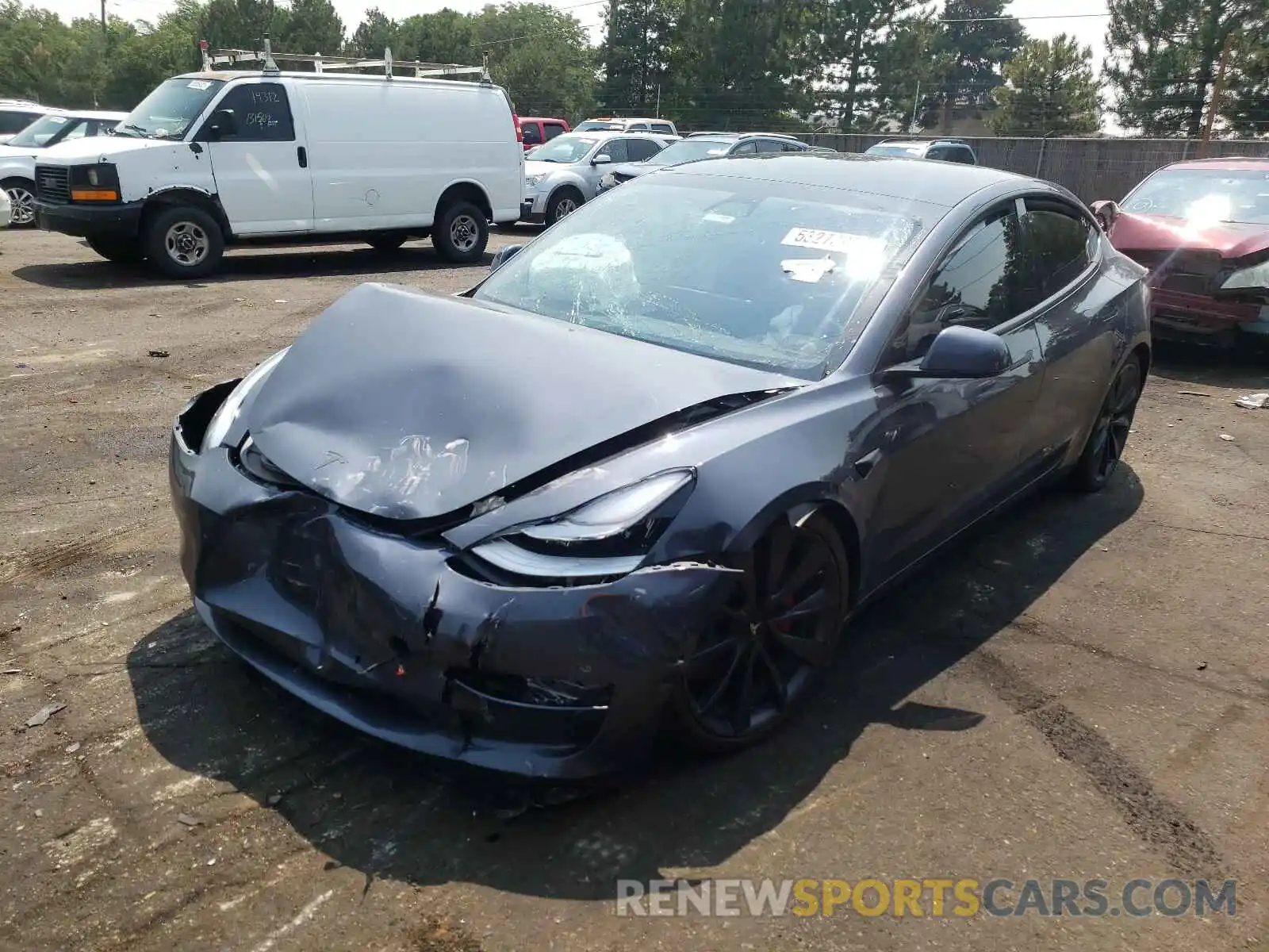 2 Photograph of a damaged car 5YJ3E1EC5LF713456 TESLA MODEL 3 2020