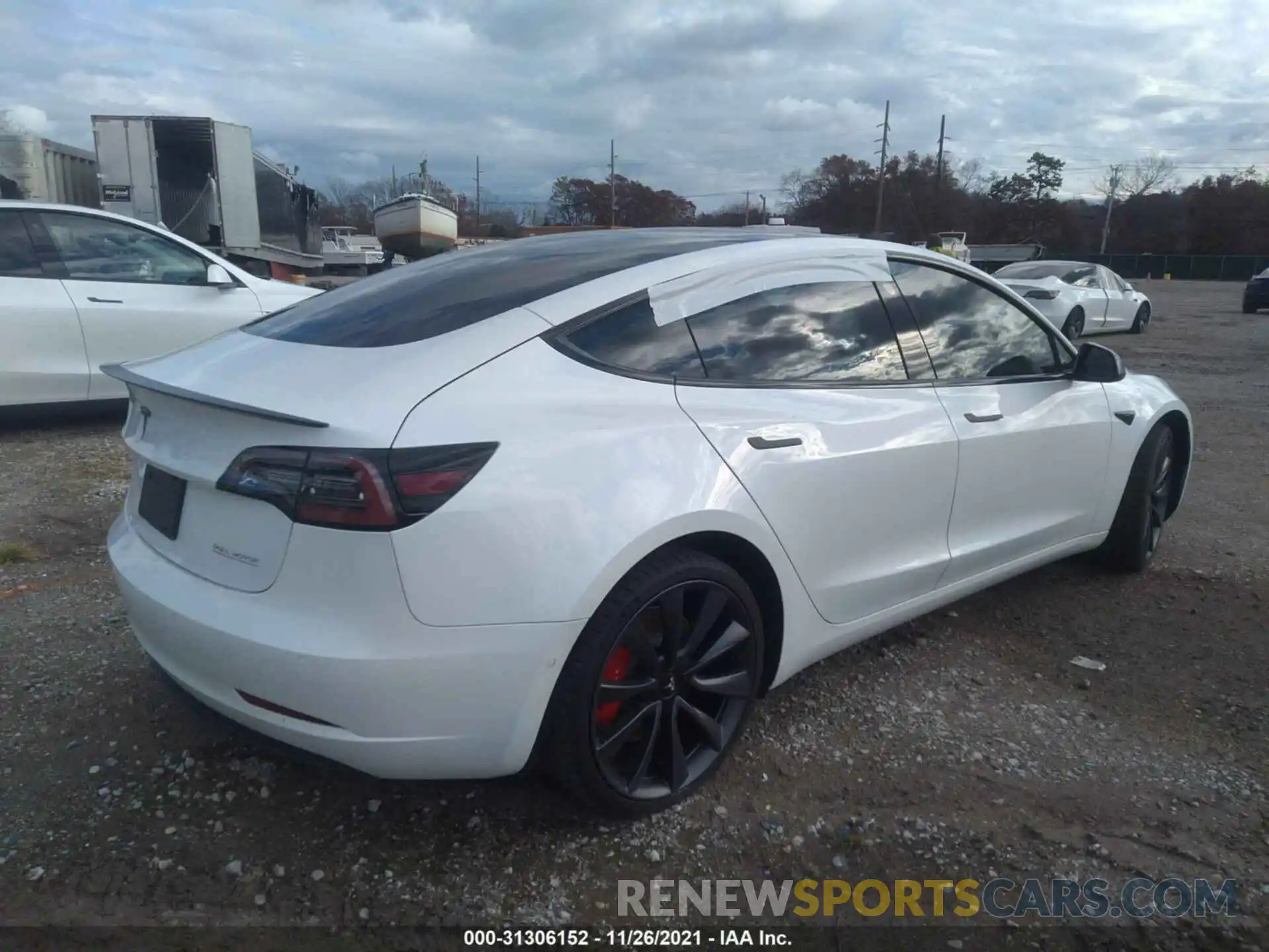 4 Photograph of a damaged car 5YJ3E1EC5LF720746 TESLA MODEL 3 2020