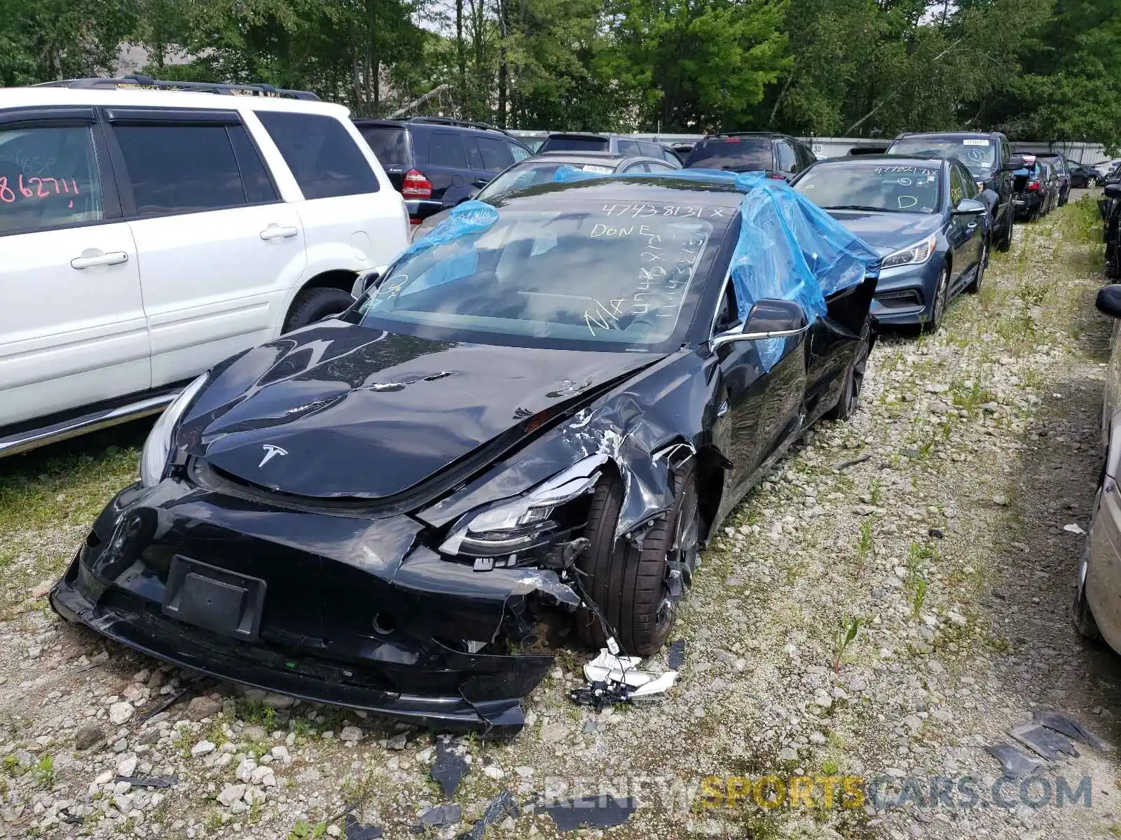 2 Photograph of a damaged car 5YJ3E1EC5LF791686 TESLA MODEL 3 2020