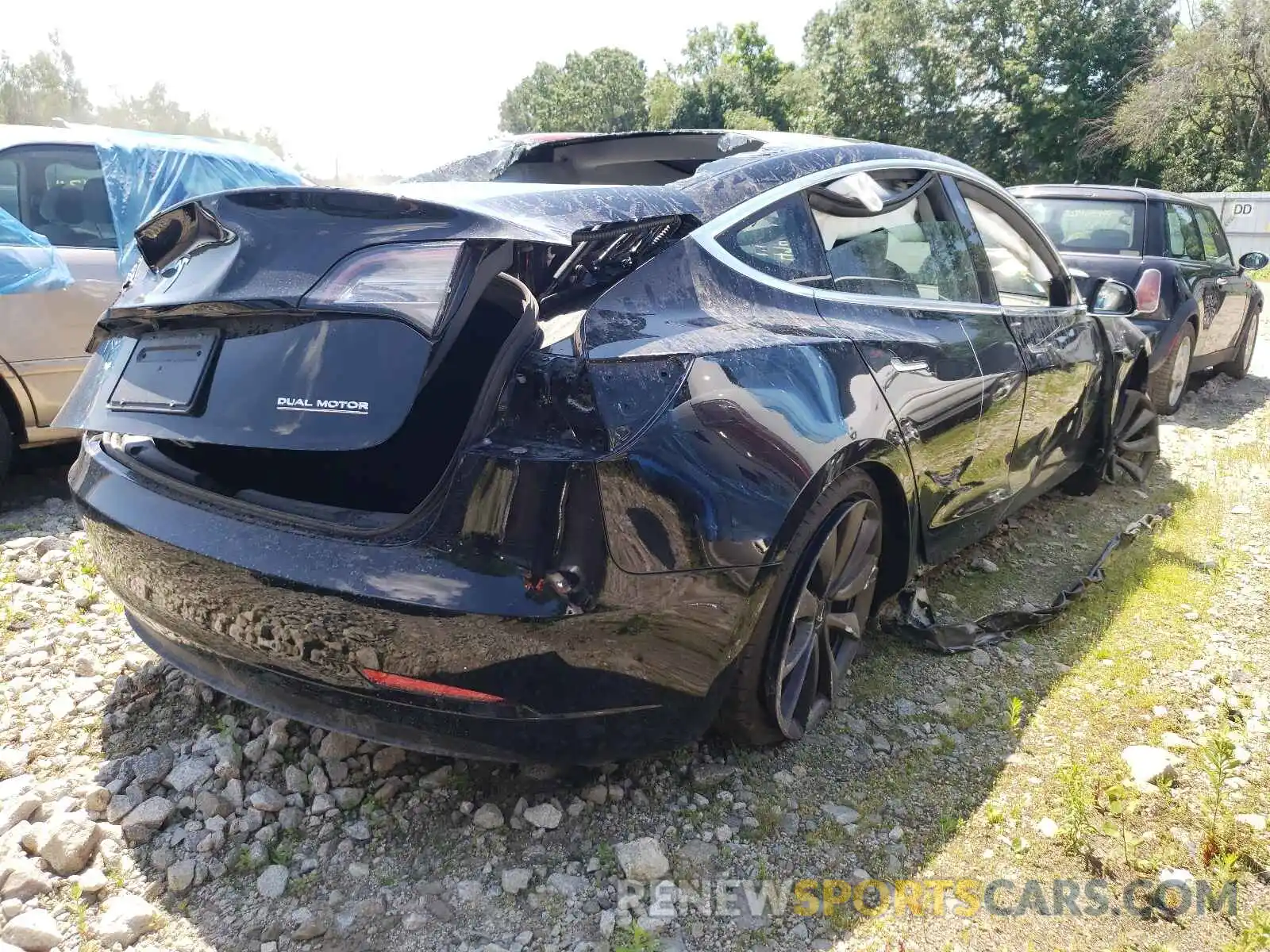 4 Photograph of a damaged car 5YJ3E1EC5LF791686 TESLA MODEL 3 2020