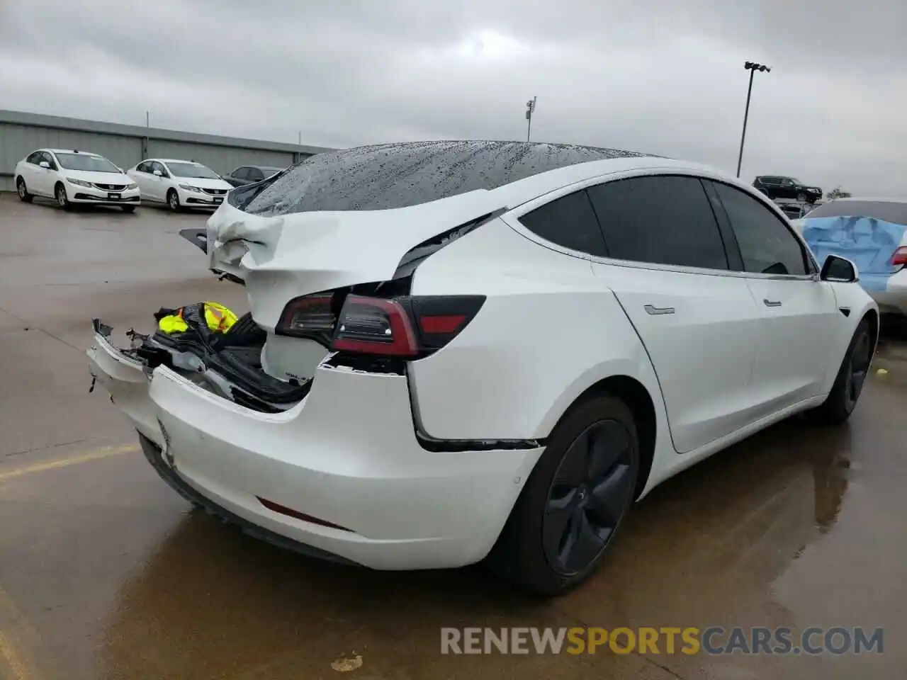 4 Photograph of a damaged car 5YJ3E1EC6LF601927 TESLA MODEL 3 2020