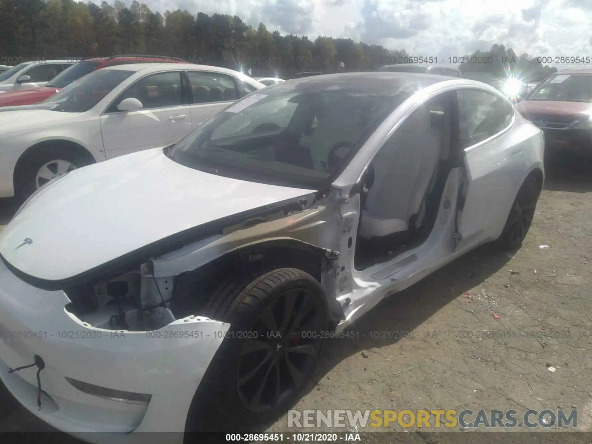 2 Photograph of a damaged car 5YJ3E1EC6LF603628 TESLA MODEL 3 2020