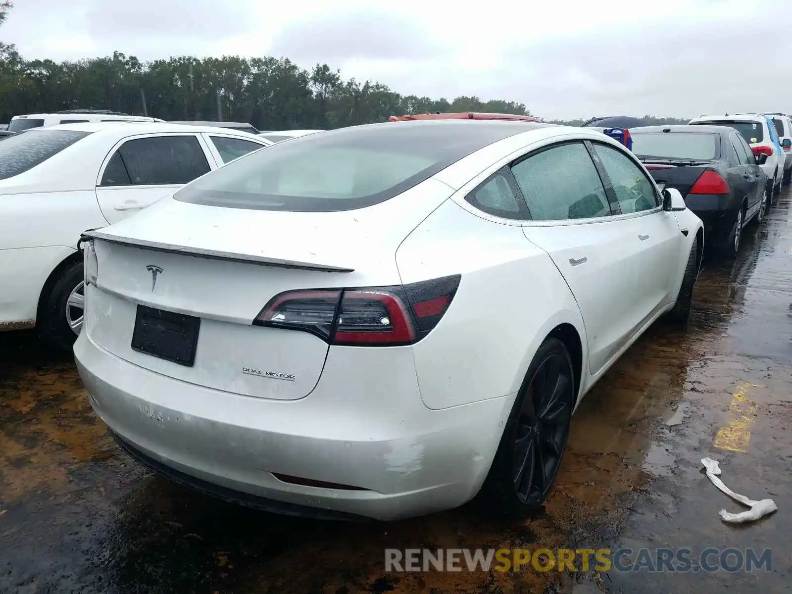 4 Photograph of a damaged car 5YJ3E1EC6LF642056 TESLA MODEL 3 2020