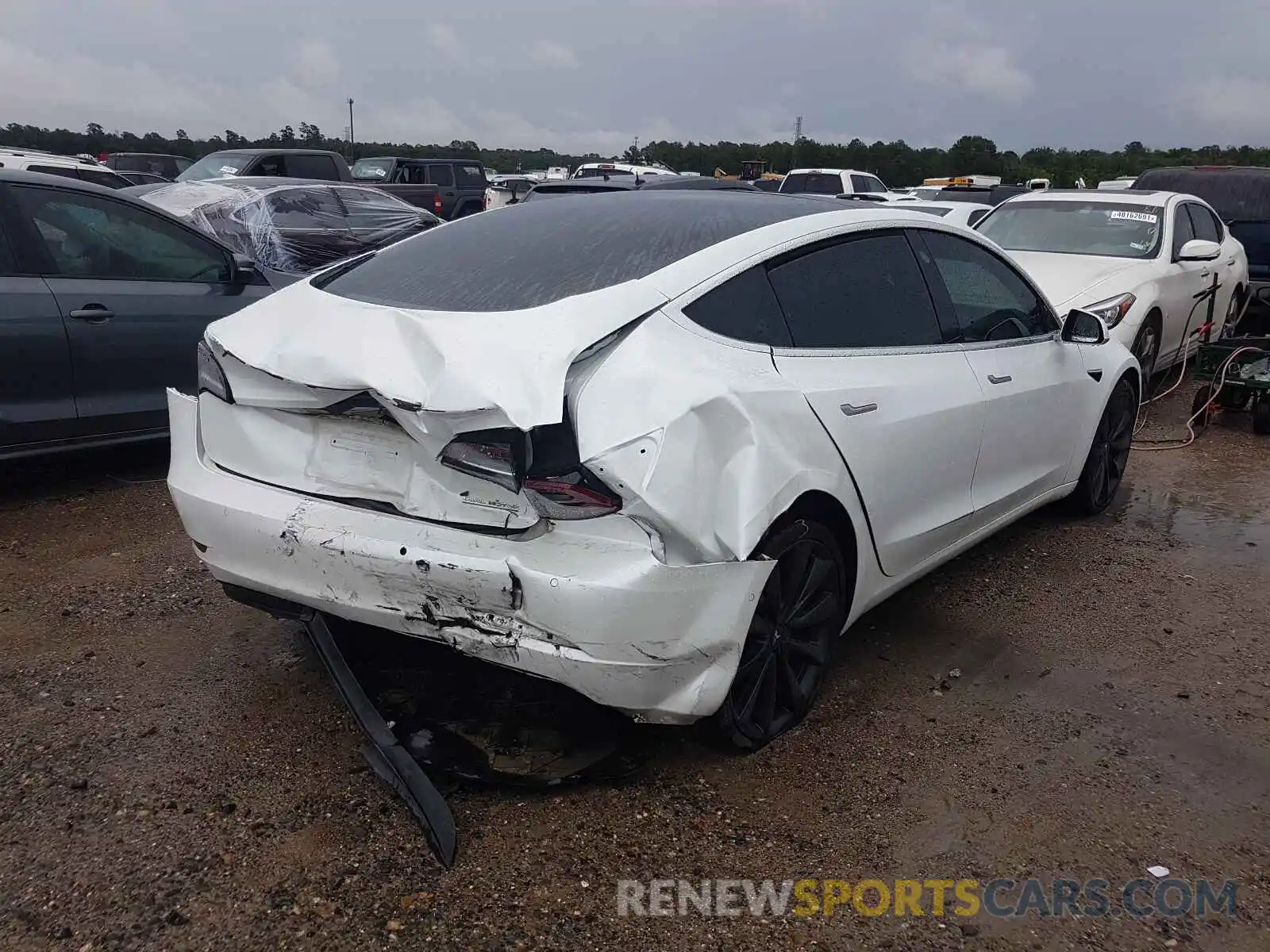 4 Photograph of a damaged car 5YJ3E1EC6LF715068 TESLA MODEL 3 2020