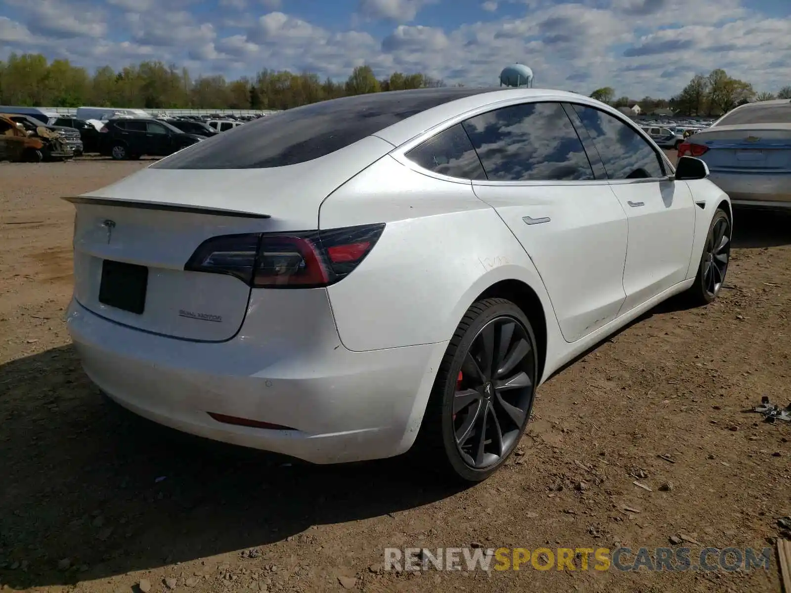 4 Photograph of a damaged car 5YJ3E1EC6LF736244 TESLA MODEL 3 2020