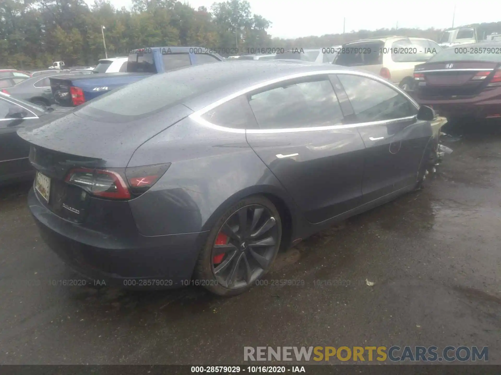 4 Photograph of a damaged car 5YJ3E1EC7LF623595 TESLA MODEL 3 2020