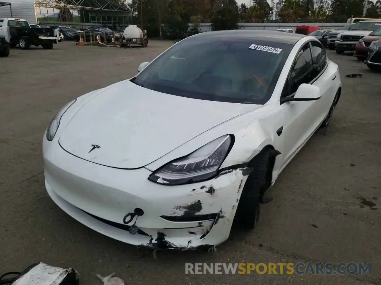 2 Photograph of a damaged car 5YJ3E1EC7LF715032 TESLA MODEL 3 2020