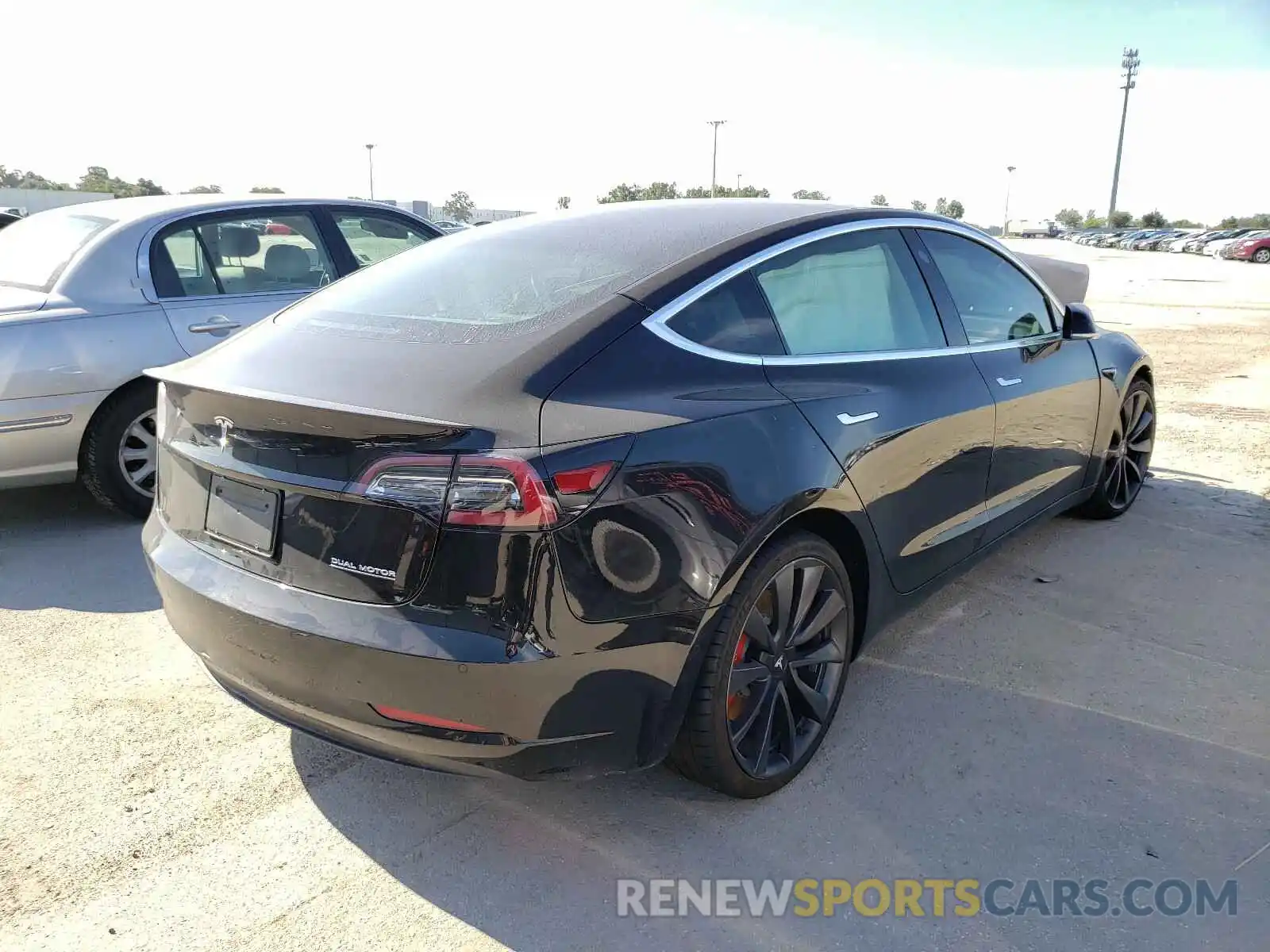 4 Photograph of a damaged car 5YJ3E1EC8LF603341 TESLA MODEL 3 2020