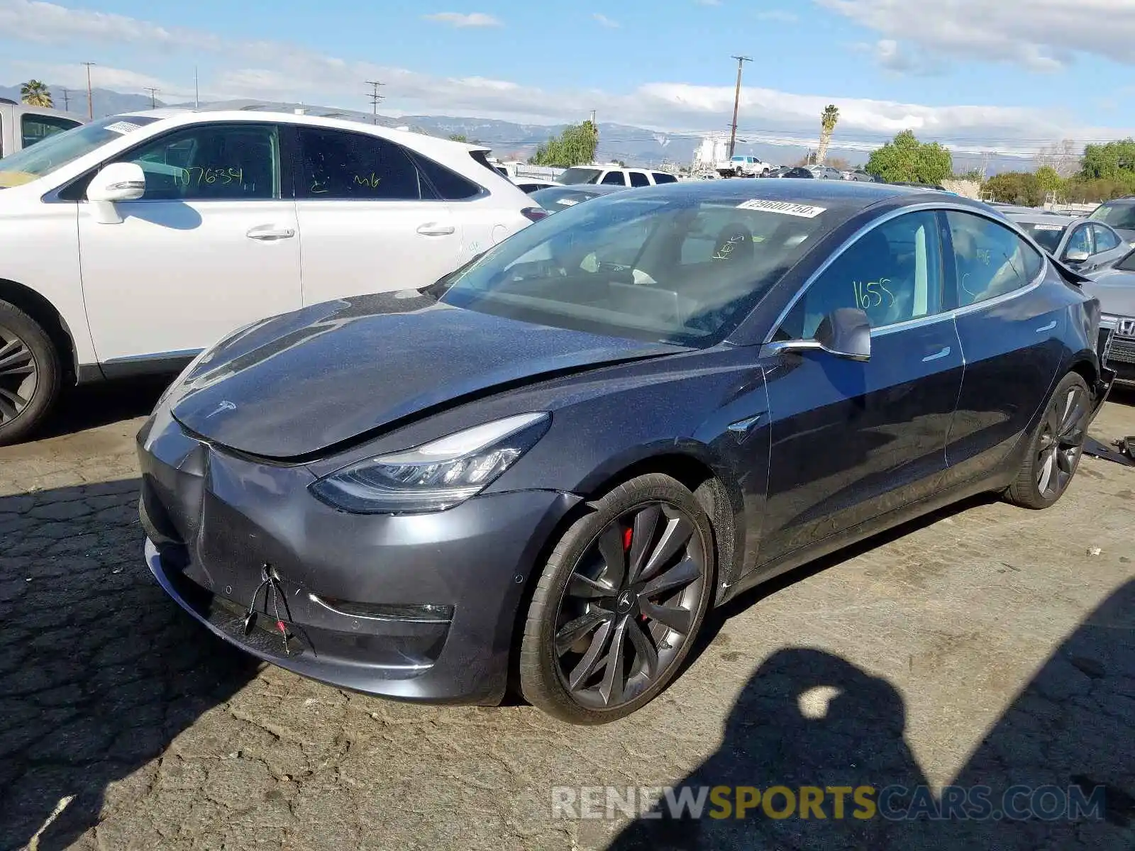 2 Photograph of a damaged car 5YJ3E1EC8LF623749 TESLA MODEL 3 2020