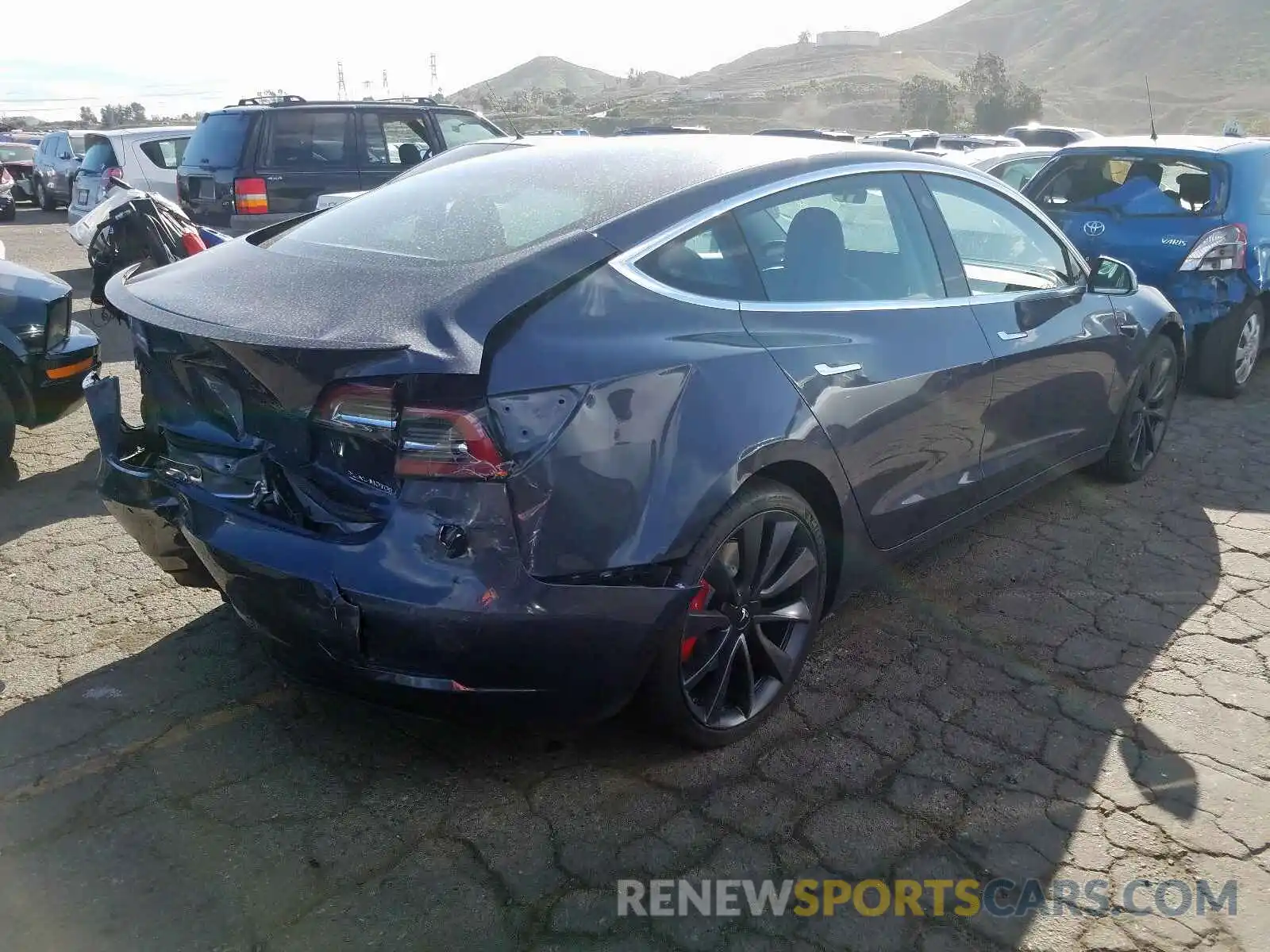 4 Photograph of a damaged car 5YJ3E1EC8LF623749 TESLA MODEL 3 2020