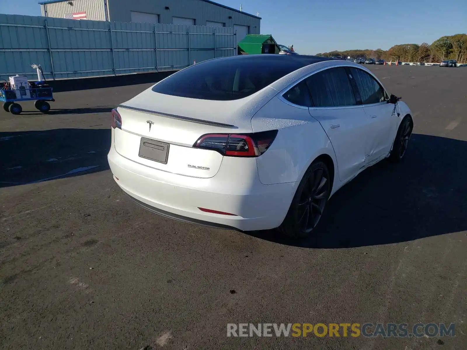 4 Photograph of a damaged car 5YJ3E1EC8LF641393 TESLA MODEL 3 2020