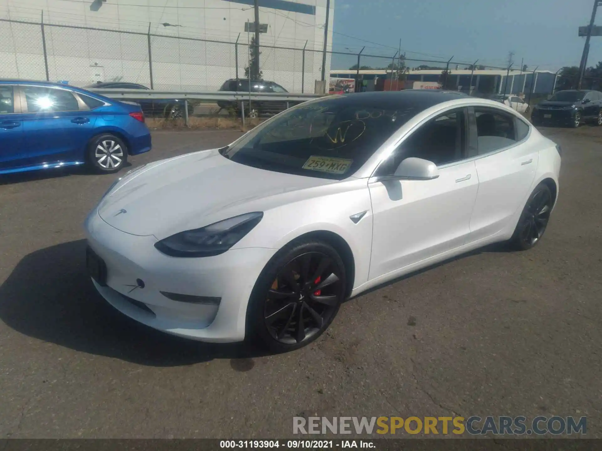 2 Photograph of a damaged car 5YJ3E1EC8LF791889 TESLA MODEL 3 2020