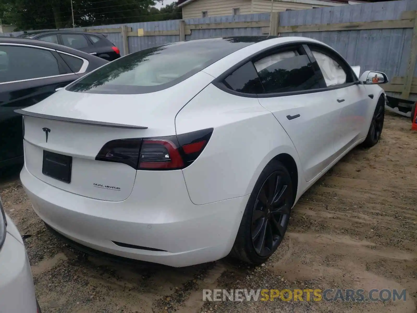 4 Photograph of a damaged car 5YJ3E1EC8LF796512 TESLA MODEL 3 2020