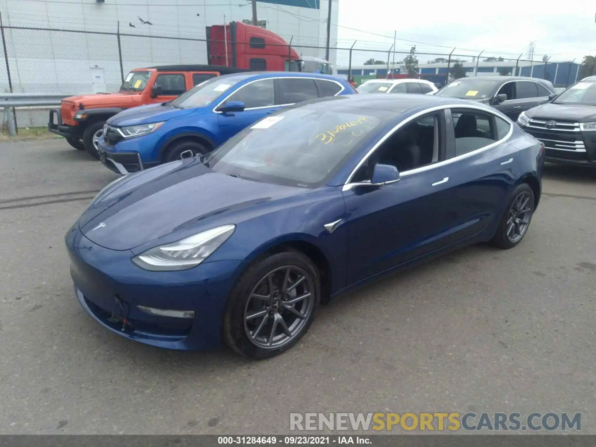 2 Photograph of a damaged car 5YJ3E1EC9LF586582 TESLA MODEL 3 2020