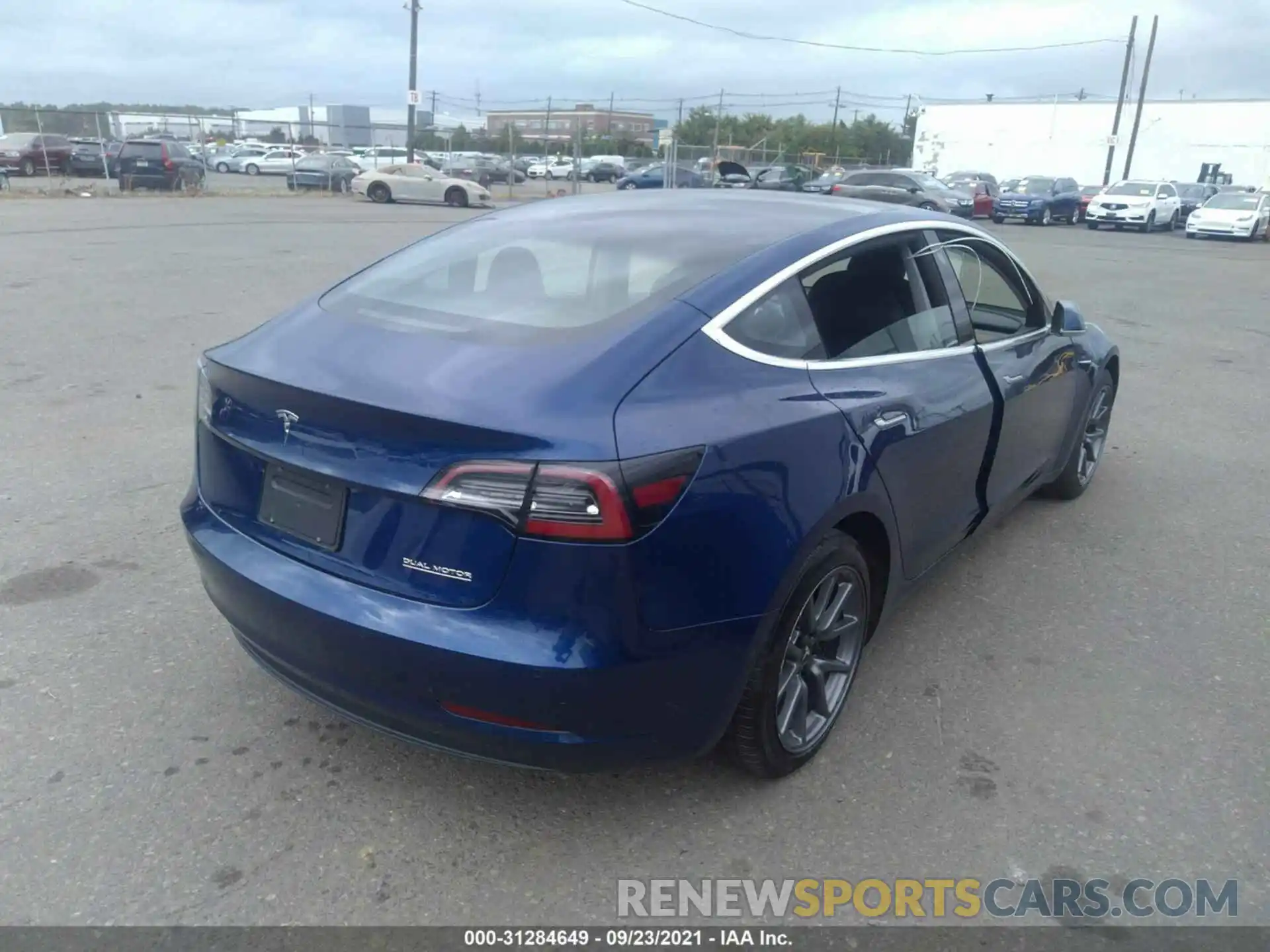 4 Photograph of a damaged car 5YJ3E1EC9LF586582 TESLA MODEL 3 2020