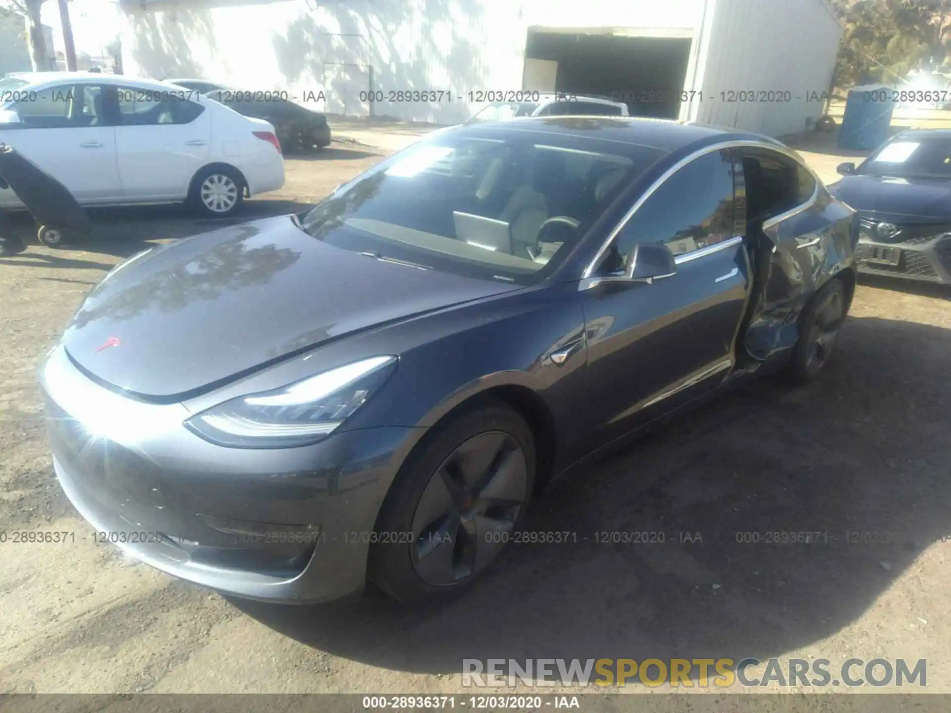 2 Photograph of a damaged car 5YJ3E1EC9LF601601 TESLA MODEL 3 2020