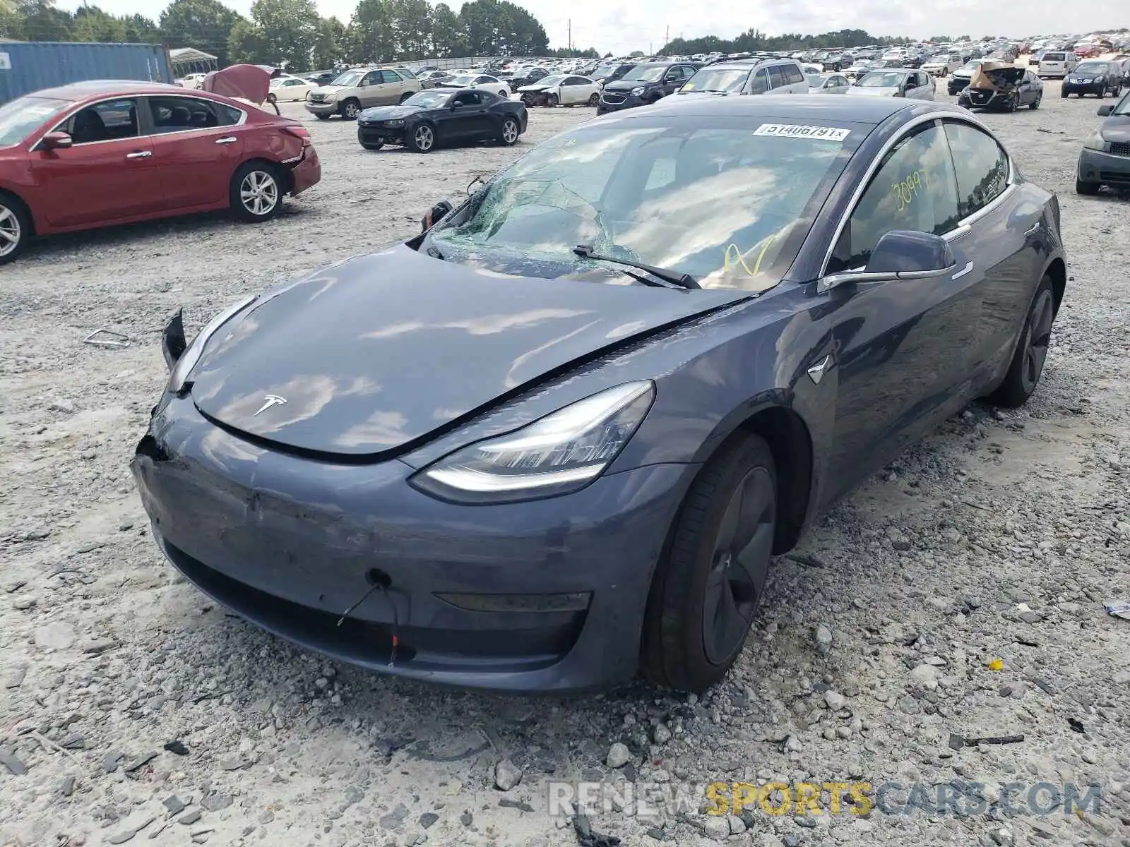 2 Photograph of a damaged car 5YJ3E1EC9LF601694 TESLA MODEL 3 2020