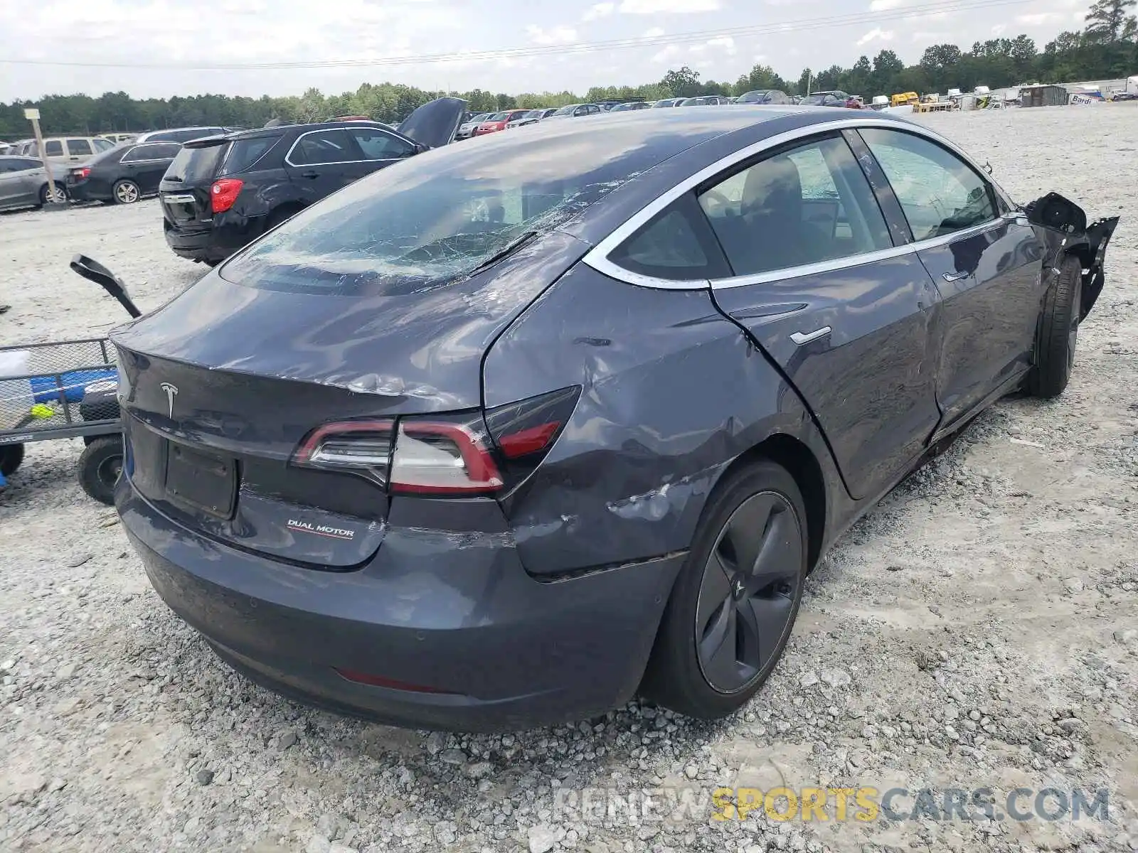 4 Photograph of a damaged car 5YJ3E1EC9LF601694 TESLA MODEL 3 2020