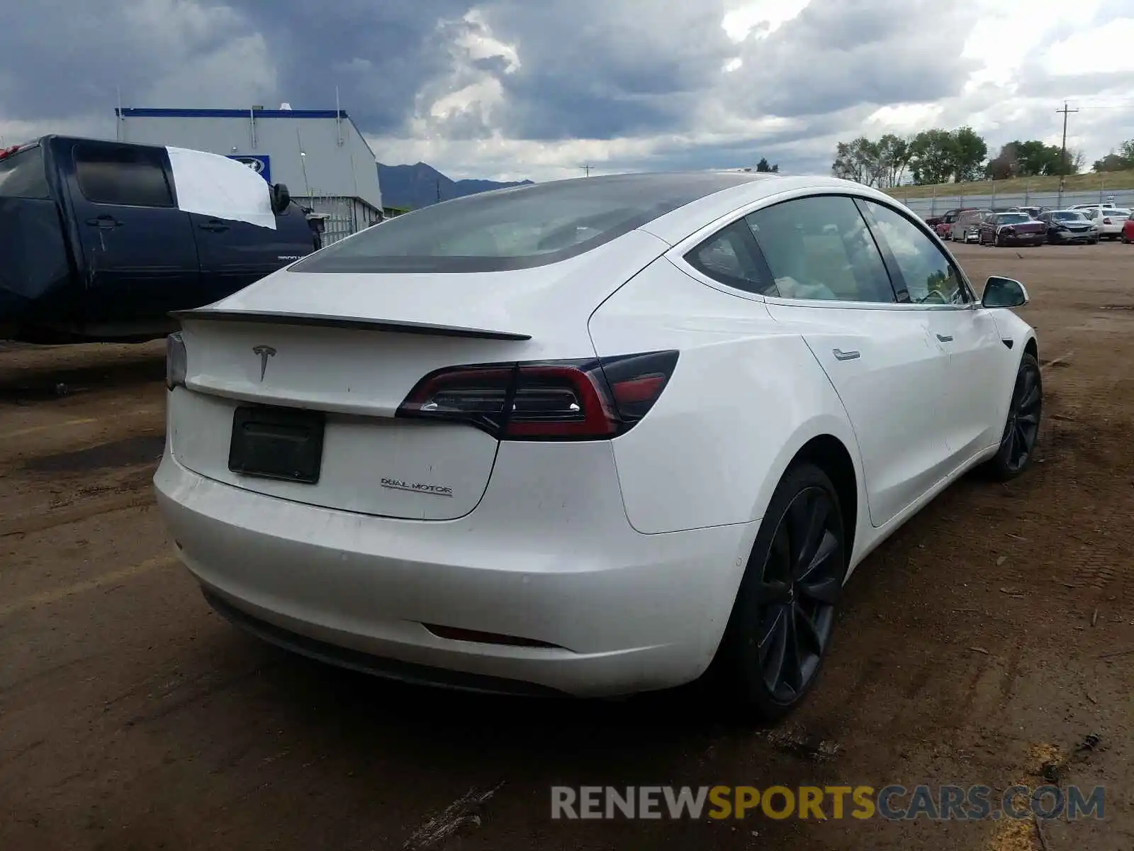 4 Photograph of a damaged car 5YJ3E1EC9LF624702 TESLA MODEL 3 2020