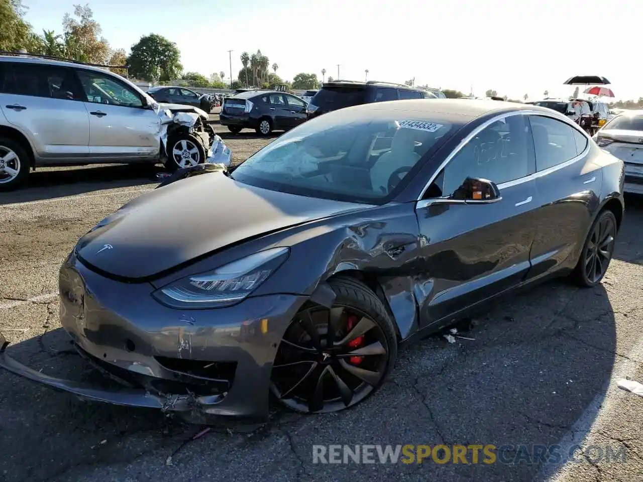 2 Photograph of a damaged car 5YJ3E1EC9LF647137 TESLA MODEL 3 2020