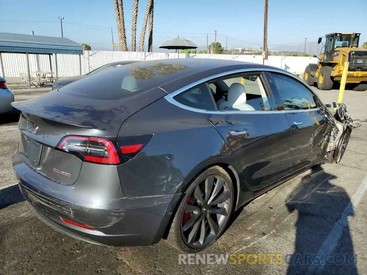 4 Photograph of a damaged car 5YJ3E1EC9LF647137 TESLA MODEL 3 2020